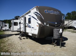 Used 2013 Keystone Outback 298RE Rear Entertainment Triple Slide available in Williamstown, New Jersey