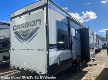 Used 2017 Keystone Carbon 33 Triple Slide, Rear 10' Cargo Area available in Williamstown, New Jersey