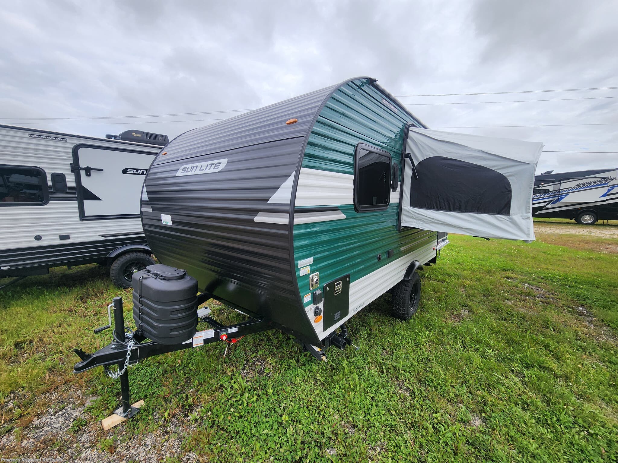 New 2027 Sunset Park RV Sun Lite 14THX w/Patio, Rear Awning and Tip-Out available in Sturtevant, Wisconsin