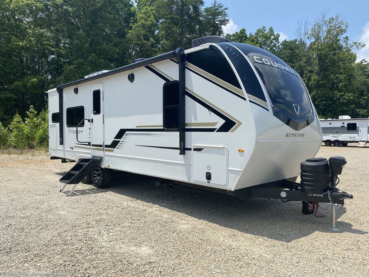 New 2026  Keystone Cougar Half-Ton 25MLE by Keystone from Blue Compass RV Danville in Ringgold, VA