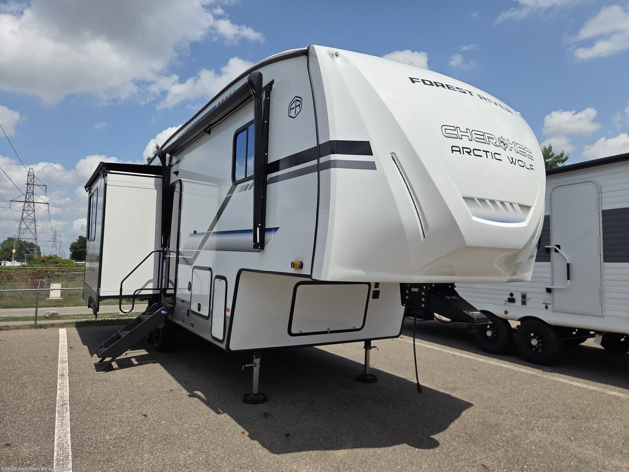 Used 2024 Forest River Cherokee Arctic Wolf 27SGS available in Grand Rapids, Michigan
