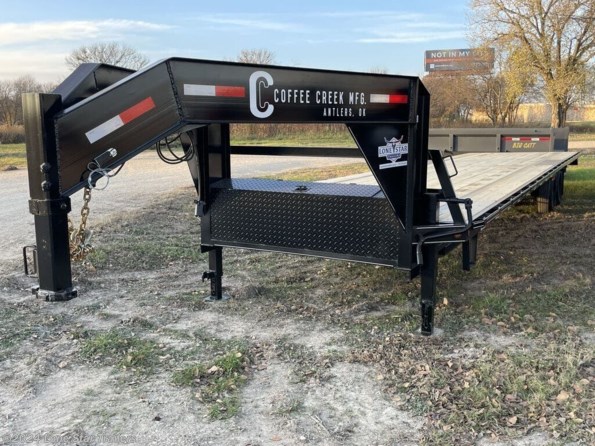 2024 Coffee Creek | 8.5x32 | GN Flatbed | 2-7k Axles | Black | Slide available in Lacy Lakeview, TX