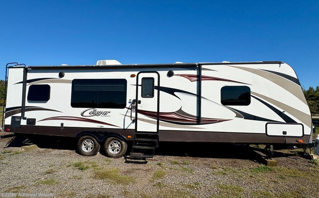 Used 2016  Keystone Cougar 29RKSWE by Keystone from National Vehicle in Canby, OR