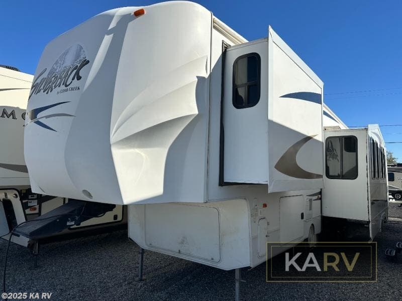 Used 2011 Forest River Cedar Creek Silverback 35QB4 available in Desert Hot Springs, California