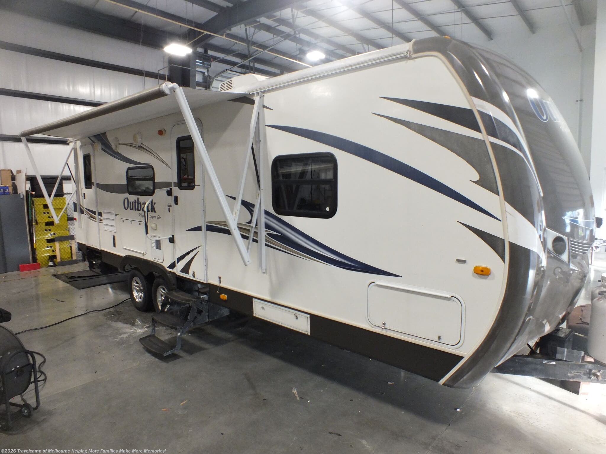 Used 2013  Keystone Outback 274RB by Keystone from Travelcamp of Melbourne in Melbourne, FL